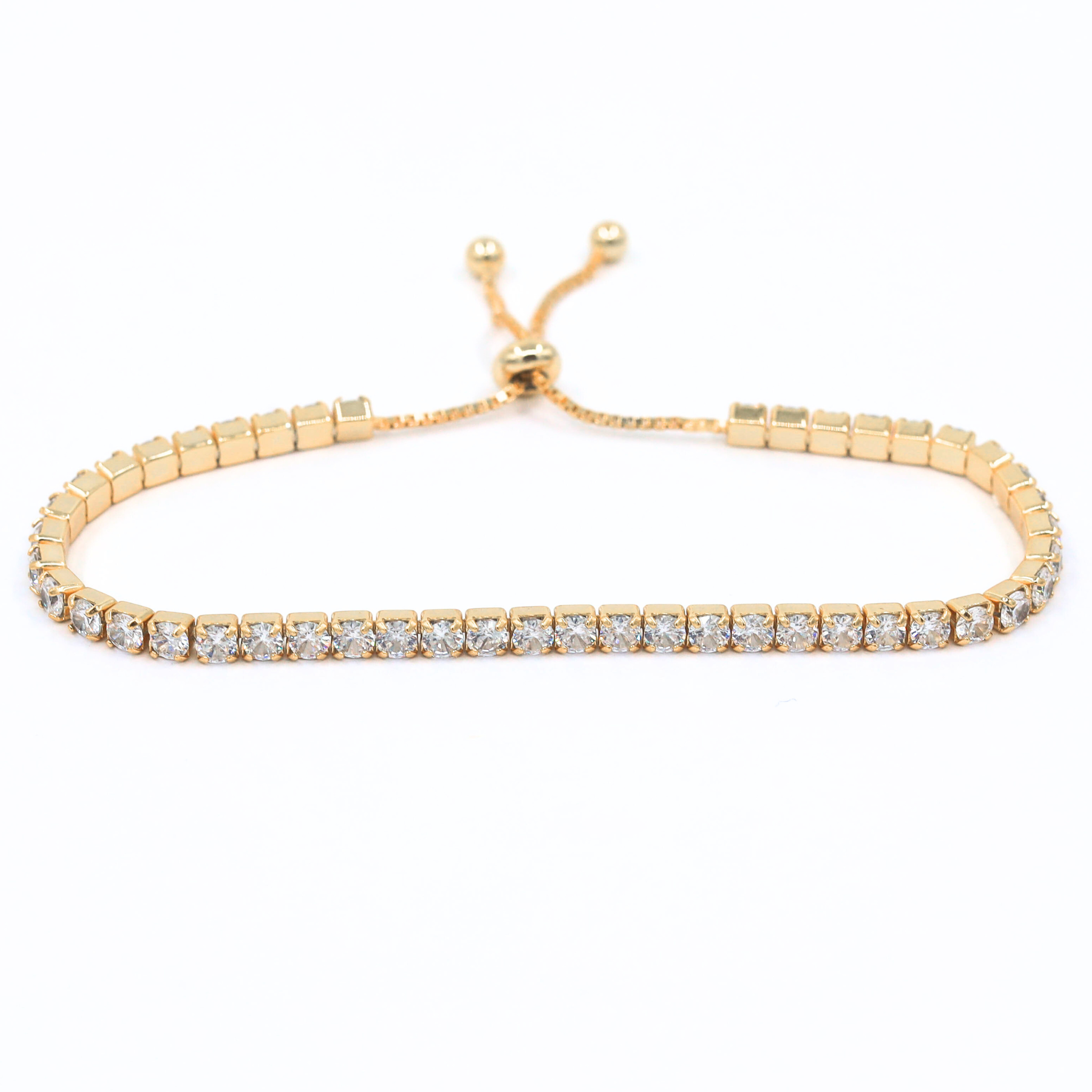 Tennis Bracelet Bijou in Gold, showcased on a white background