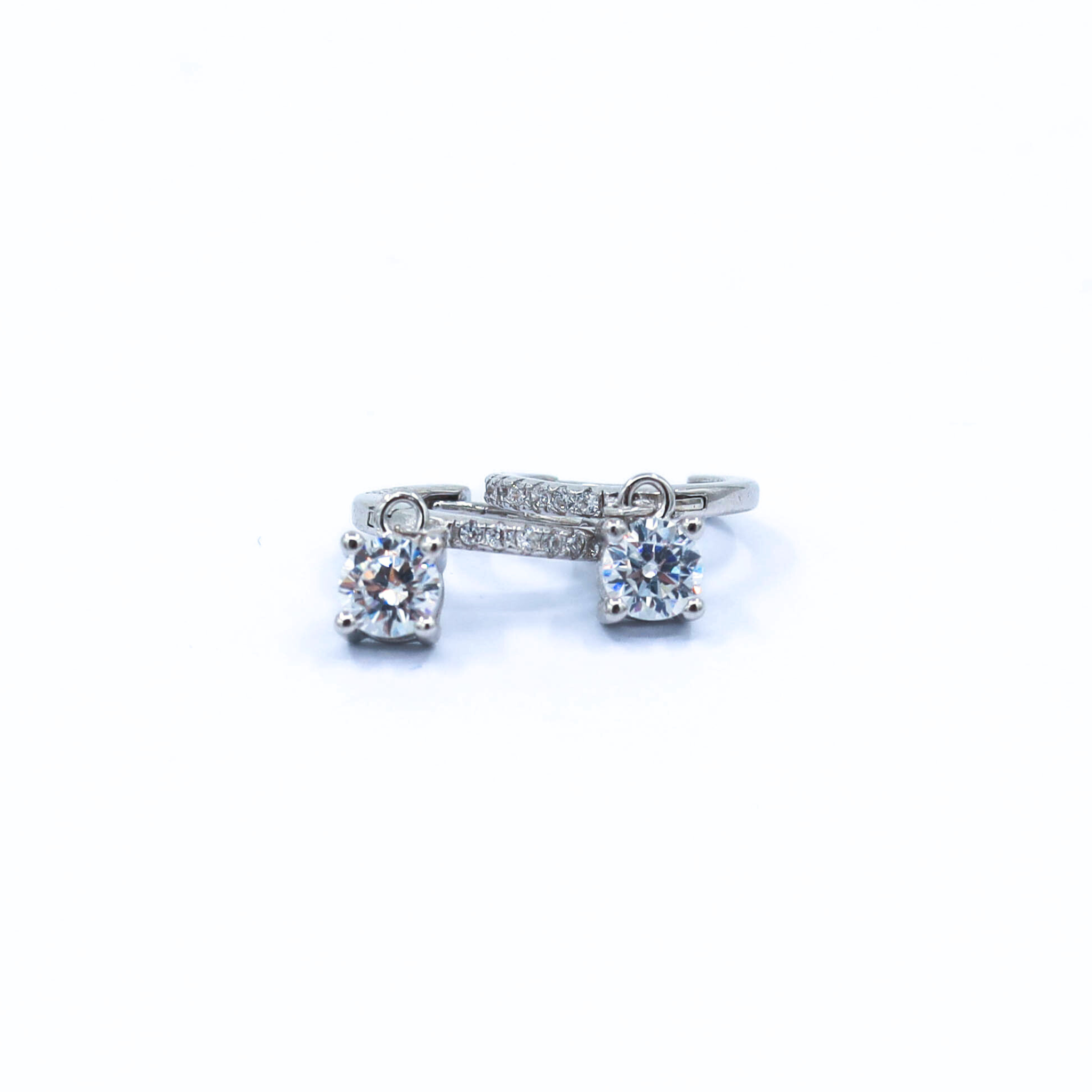 Hoop Earrings in silver, showcased on a white background, one on top of the other