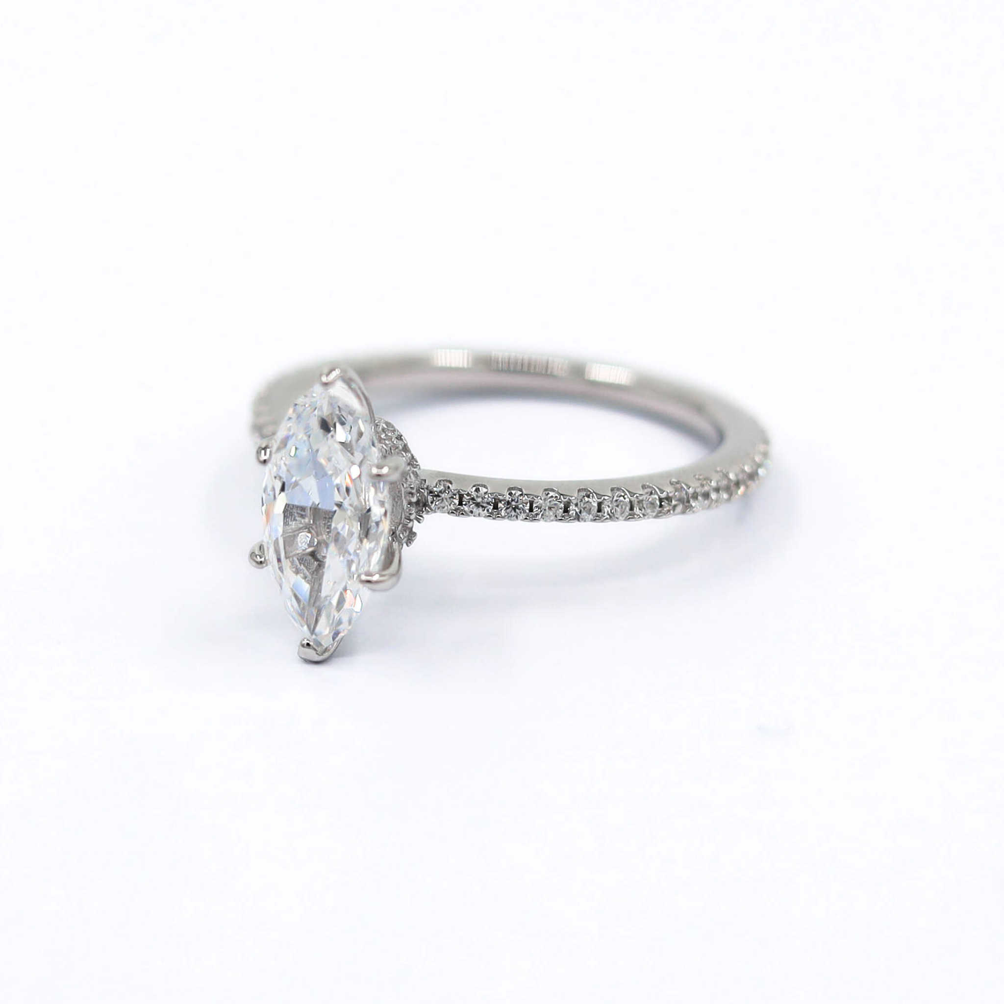 Marquise Cut Ring in sterling silver, showcased on a white background, shown from the side