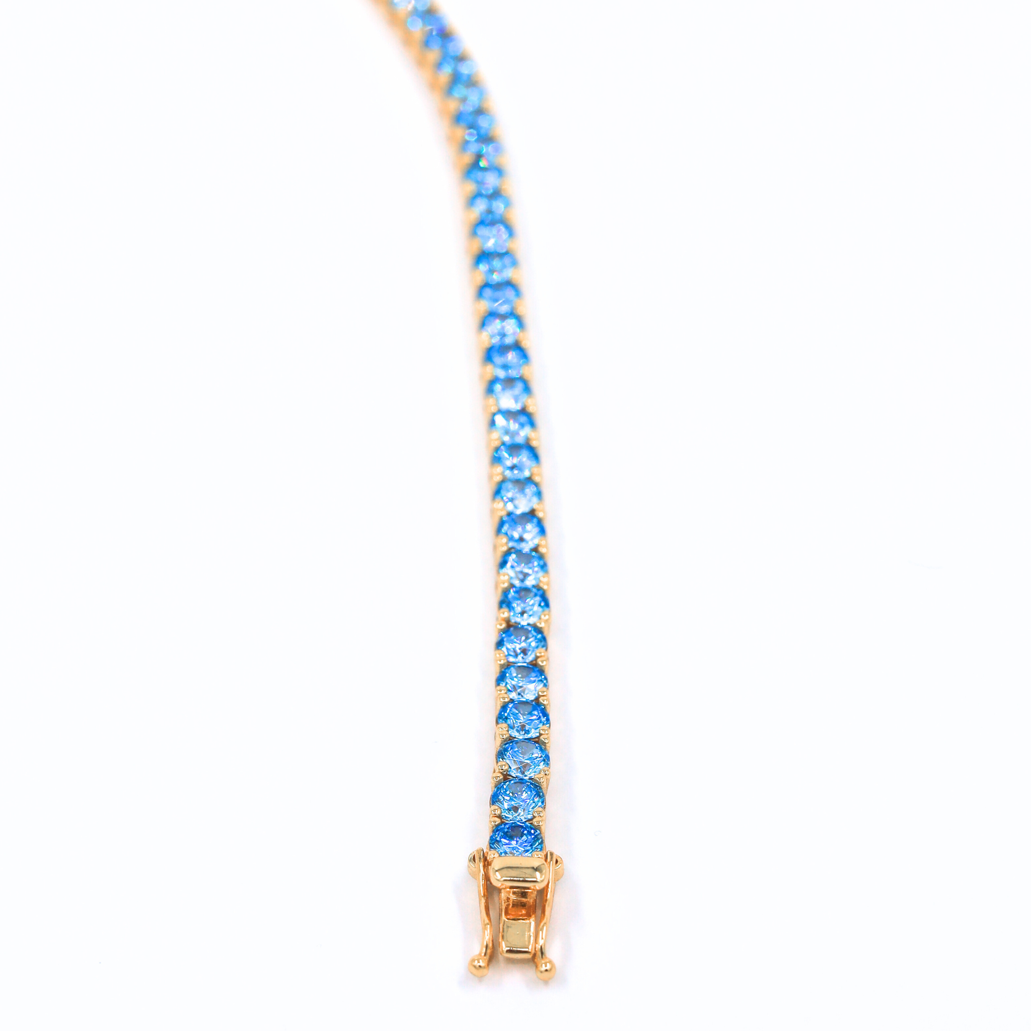Aqua Dream Tennis Bracelet-Blue 925 silver tennis bracelet gold plated, showcased on a white background